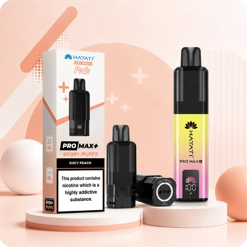 Genuine Hayati Pro Max Plus pods box (Juicy Peach) with the pod, cartridge and 6000 kit on a peach plinth
